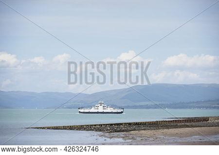 Ferry Ship Departing From Largs Sailing To Millport