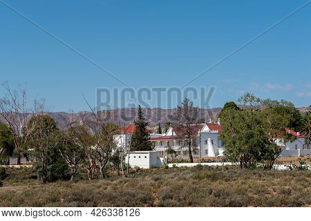 Matjiesfontein, South Africa - April 20, 2021: The Back Of The Lord Milner Hotel, As Seen From The E