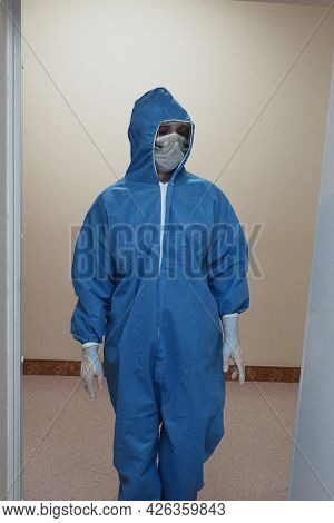 The Work Of A Radiologist In Antiviral Overalls In The X-ray Room For Diagnostics.
