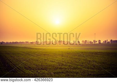 A Summer Sun Rising In A Very Hazy Morning With Lots Of Dust Particles In The Air. Misty Sunrise. Su