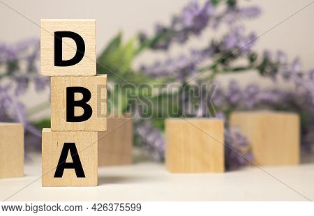Dba Acronym From Wooden Blocks With Letters, Database Administrator Or Doing Business As Abbreviatio