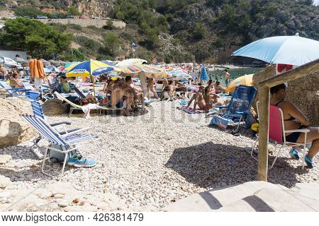 La Granadella  Spain - August 20 2016; Busy And Over-crowded Beach In Summer At La Granadella, Alica