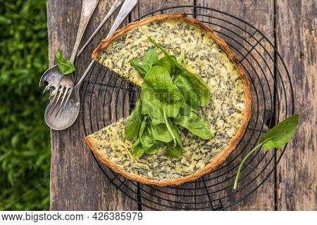 Quiche With Spinach - Traditional Dish Of French Cuisine. Spinach  Tart