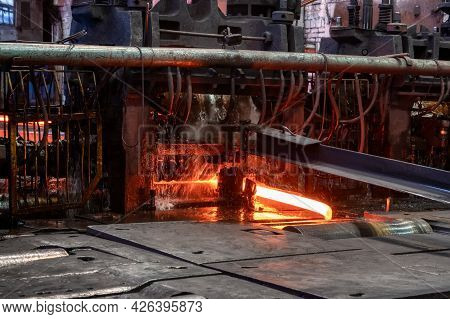The Process Of Rolling Hot Rolled Steel In A Rolling Mill.