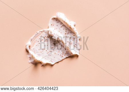 Sample Of Natural Scrub On Nude Pink Background. Peeling Cream With Microcapsules. Peach Or Coffee S