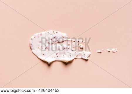 Sample Of Natural Scrub On Nude Pink Background. Peeling Cream With Microcapsules. Peach Or Coffee S