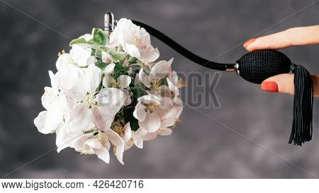 Bottle Of Eau De Toilette Or Perfume Made From Apple Blossom With Long Black Tassel Spray Pomp And F