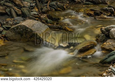 Nice Color Clean Creek Near Huttschag Village In Summer Hot Day