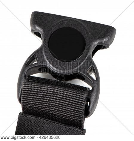 Black Plastic Fastex Clip For Backpacks On A White Background. Items Of Clothing And Equipment.