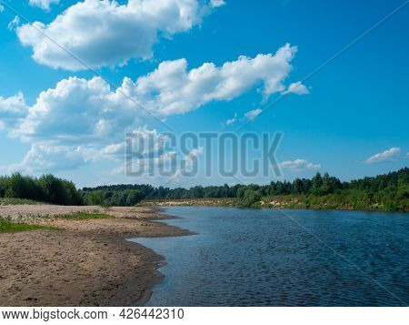 Beautiful Landscape View Of Forest River  And Sandy Beaches Along The River In Summer Sunny Day.
Wid