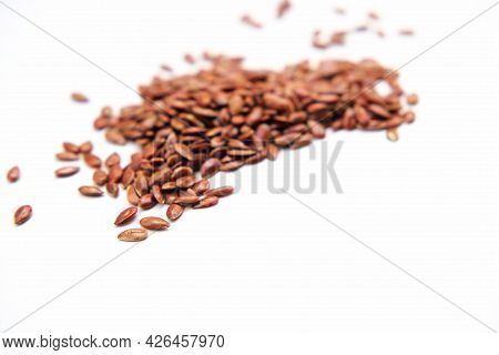 Flaxseed Or Lineseed Pile On White Backgroung