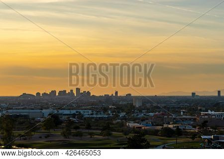 The Phoenix Arizona skyline at sunset near Papago Park