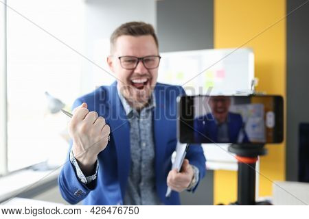Male Blogger Emotionally Tells Interesting Successful Content On Camera