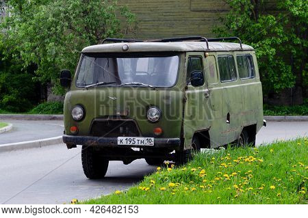 Petrozavodsk, Russia - 1 June 2021. Dark Green Uaz 452. Old Rusty Soviet Car