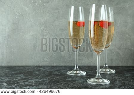 Concept Of Delicious Drink With Rossini Cocktail On Black Smoke Table