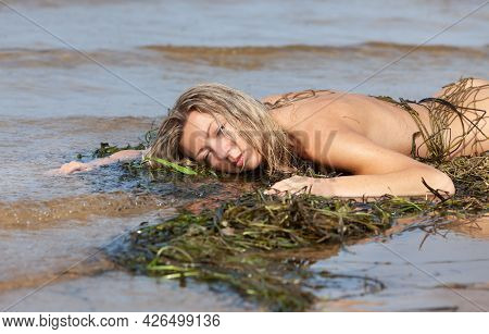 Nude Woman And Fishing Net