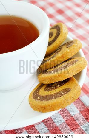 Bolinhos e chá de ervas
