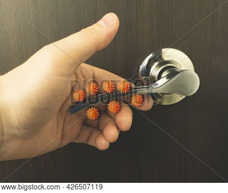 Viruses On The Door Handle. The Concept Of Microbes Sitting On The Door Handle.