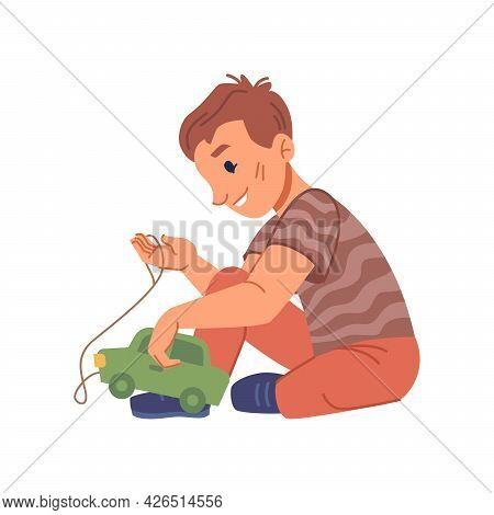 Active Boy Kid Playing With Plastic Car Toy, Isolated Kiddo From Kindergarten Or Preschool Education