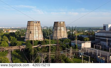 Aerial Drone View Flight Near Thermal Power Plant. Cooling Towers Of Chp