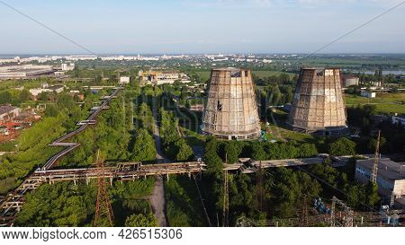 Aerial Drone View Flight Near Thermal Power Plant. Cooling Towers Of Chp