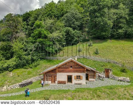 Drone View At The Alp Chalet Of Heidi Village Over Maienfeld In The Swiss Alps