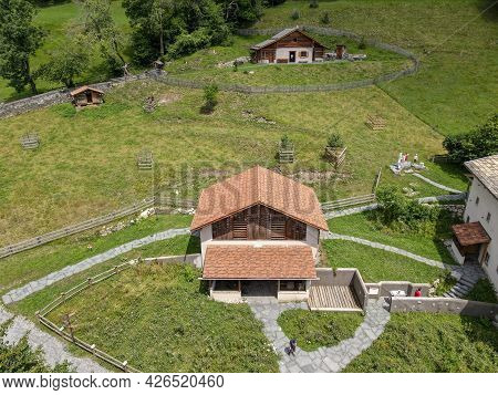Drone View At The Village Of Heidi Over Maienfeld In The Swiss Alps