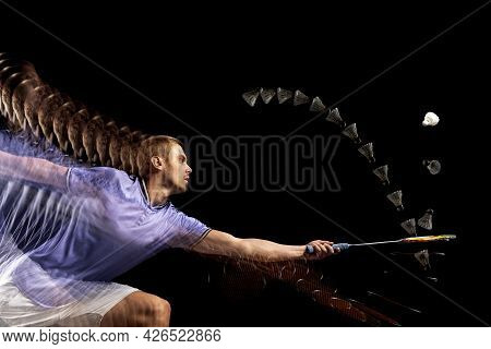 Spectacular Trajectory Of Movement. One Young Male Badminton Player, Shuttler Training Isolated On D