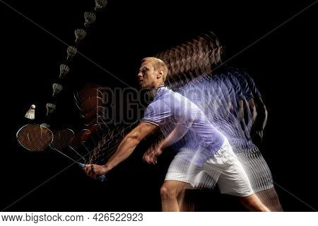 Young Male Badminton Player, Shuttler In Motion And Action On Dark Background. Stroboscope Effect.