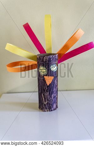 Child Artwork Representing A Face, Made With Used Toilet Paper Roll And Coloured Paper. Handicraft. 