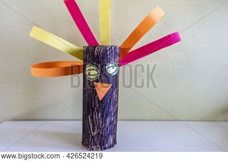 Child Artwork Representing A Face, Made With Used Toilet Paper Roll And Coloured Paper. Handicraft. 