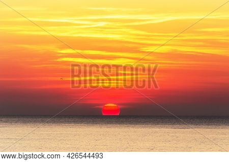 A Breathtaking View Of The Picturesque Yellow-red Sunrise Over The Sea. Bright Yellow-red Sky, Red S