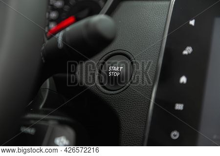 Novosibirsk, Russia - June 29, 2021: Renault Arkana, Car Dashboard:  Black Engine Start Stop Button,