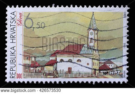 ZAGREB, CROATIA - SEPTEMBER 03, 2014: A stamp printed in Croatia shows Glina, Series Croatian Towns, circa 1995