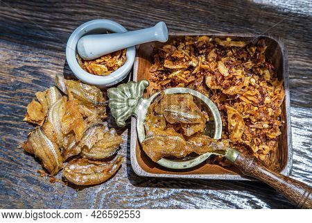 Dried Chilli Paste With Crispy Fish Thai Style Or Crispy Fish Chilli Paste In Ceramic White Cup On W