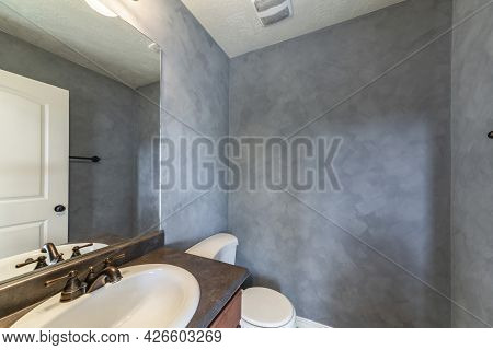 Small Bathroom Interior With Faux Paint Concrete Wall