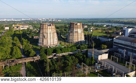 Aerial Drone View Flight Near Thermal Power Plant. Cooling Towers Of Chp
