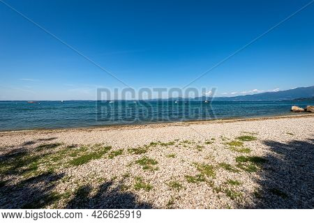 Beautiful Empty Beach On Lake Garda (lago Di Garda) Between The Small Villages Of Lazise, Bardolino 