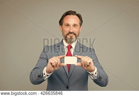 Confident Man In Smart Wear Hold Card. Showing His Business Card. Expert In Legal Affairs. Mature Ge