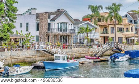 Pano Leaisure Boats Docked On Canal In Long Beach Neighborhood With Resort Like Views