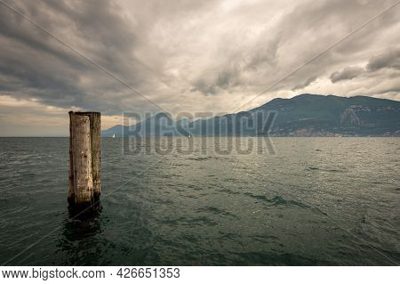 Lago Di Garda. The Lake Garda View From The Port Of The Small Village Of Castelletto Di Brenzone, Br