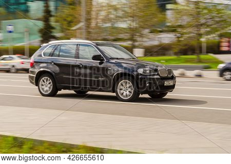 Moscow, Russia - May 2021: Black Suv Bmw X5 Riding In The Street On High Speed