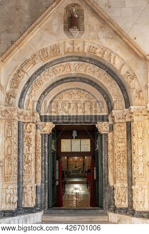 Trogir, Croatia - September 9, 2019: Radovan's portal of the St Lawrence cathedral church in Trogir, Croatia.