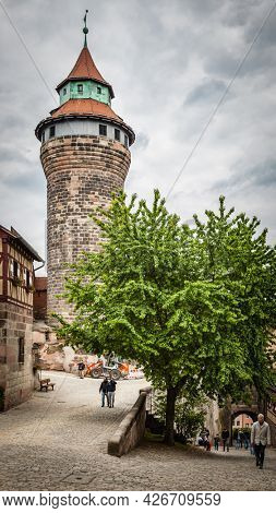 Nuremberg, Germany - May 17, 2016:  Sinwell tower in Kaiserburg in the old town of Nuremberg. Landmark of the city, cityscape
