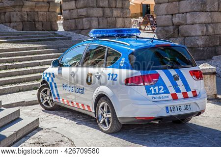 Segovia, Spain - September 21, 2015: Police car Seat Altea XL by Roman aqueduct in Segovia