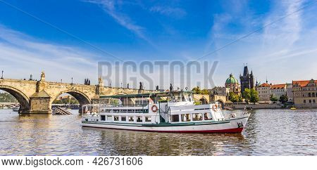 Panorama Of A Tourist Boat On The River Vltava (moldau) In Prague, Czech Republic