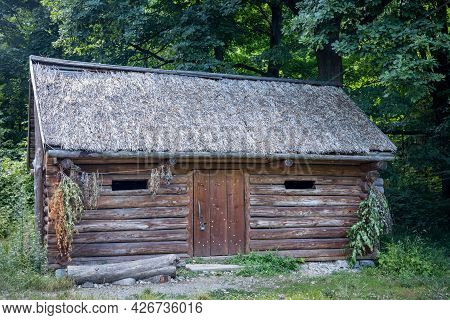 An Old Wooden Cottage In Bedkowice Archeological Reserve, Sobotka, Poland. 6.07.2021.