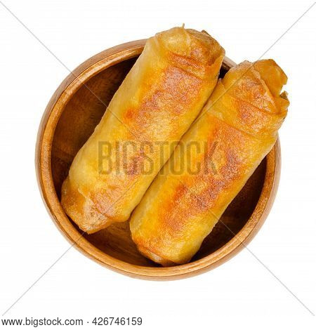 Fried Spring Rolls, In A Wooden Bowl. Two Spring Rolls, Crispy Fried In A Pan. Filled And Rolled Wra