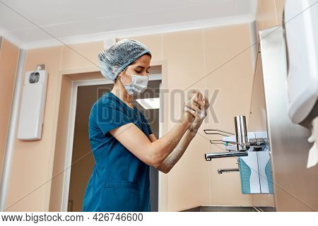 Woman Doctor, Washing Her Hands Close-up, In The Preoperative Unit, Disinfection Of Hands, Plastic S