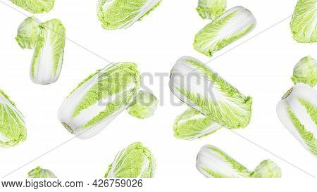 Peking Cabbage Leaves Isolated On A White Background. Paking Cabbage Flying.